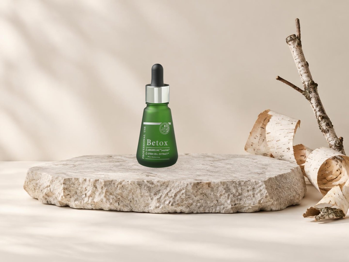 Snow White Betox serum with birch bark on a natural stone